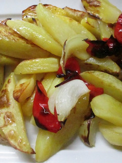 Una foto de Gajos de patatas horneados