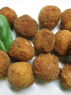 Una foto de Bolitas de arroz especiado