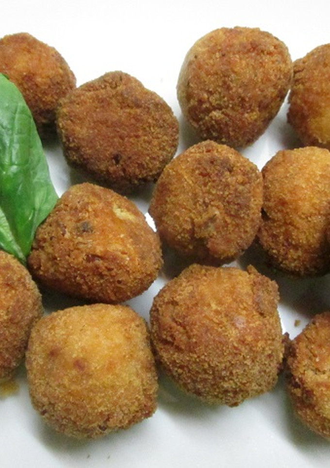 Una foto de Bolitas de arroz especiado