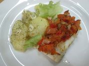 Una foto de bacalao con papas