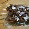 Sate daging sapi dikomo