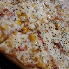 A picture of Cheesy Corn pizza.