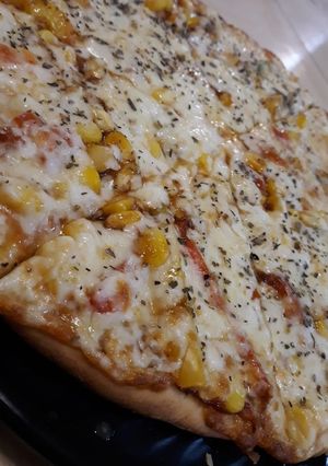 A picture of Cheesy Corn pizza.
