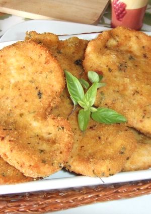 Una foto de Milanesas de pavo al curry