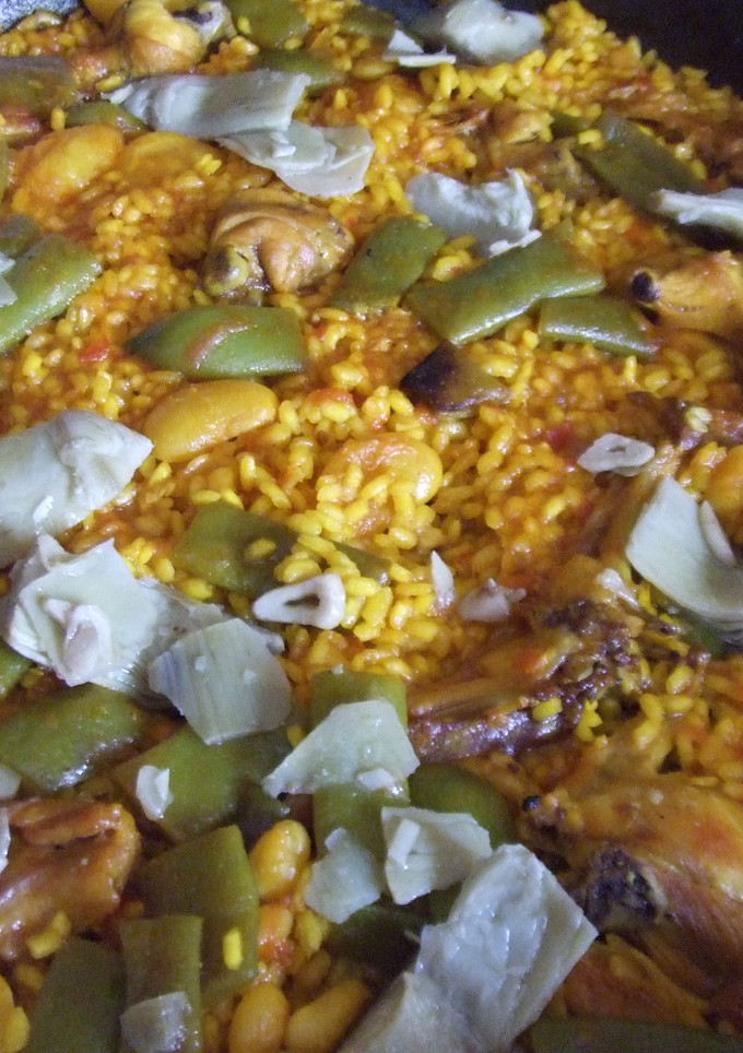 Una foto de Conejo con arroz y verduras