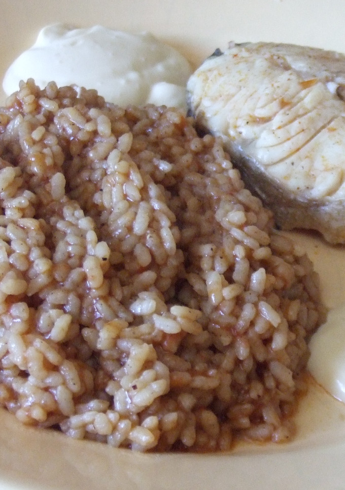Una foto de Arroz meloso con merluza de pincho 