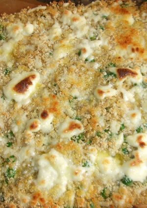 Una foto de Pastel de quinoa horneado con variedad de quesos