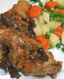 Conejo de monte a la cacerola con vermú y verduras a la mantequilla