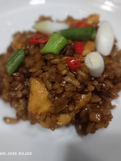 Una foto de Arroz y pollo 🐓