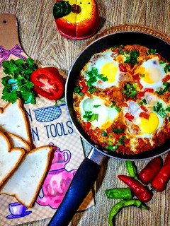 A picture of Egg In Tomato Curry.