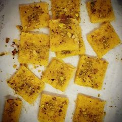 A picture of Kesar Coconut Burfi.