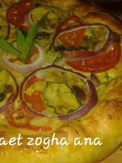 صورة لوصفة بيتزا بالصوص الابيض والنعناع