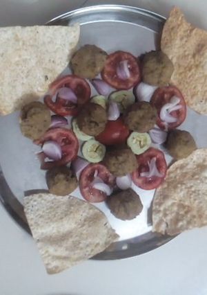 A picture of Green peas and brown rice croquettes.
