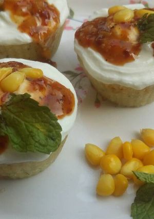 A picture of Idli muffins with Chilli corn sauce.