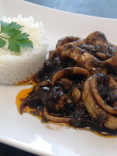 Una foto de Calamares en su tinta