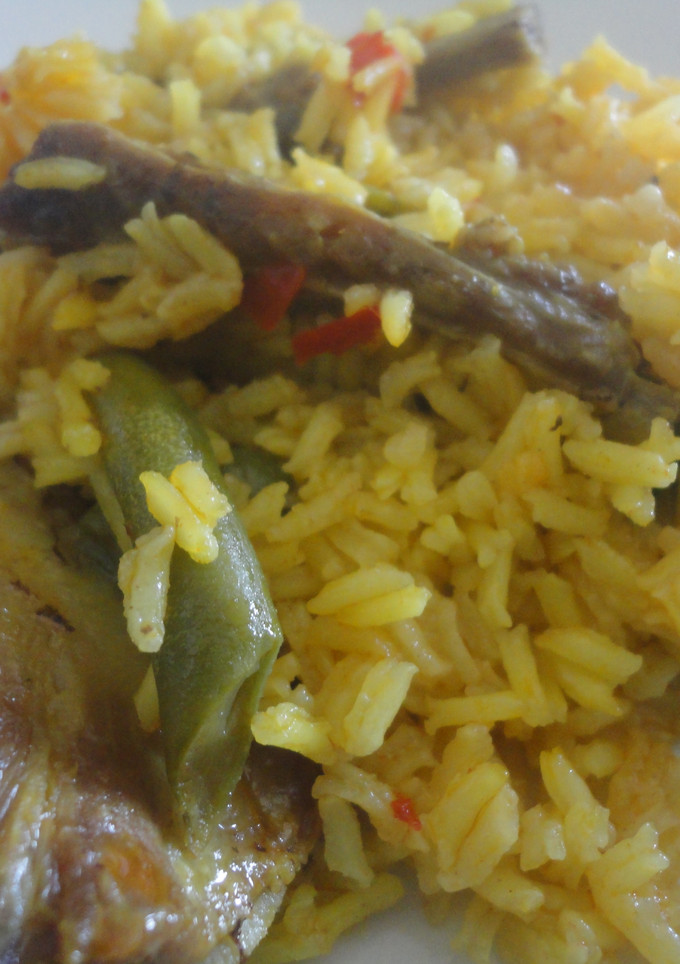 Una foto de Arroz con costilla ibérica y judías verdes