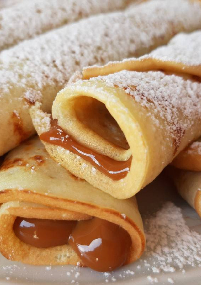 Una foto de Panqueques con dulce de leche