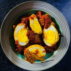A picture of Roasted Chilli Duck Egg with Broccoli.
