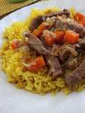 Arroz graneado con encebollado de carne