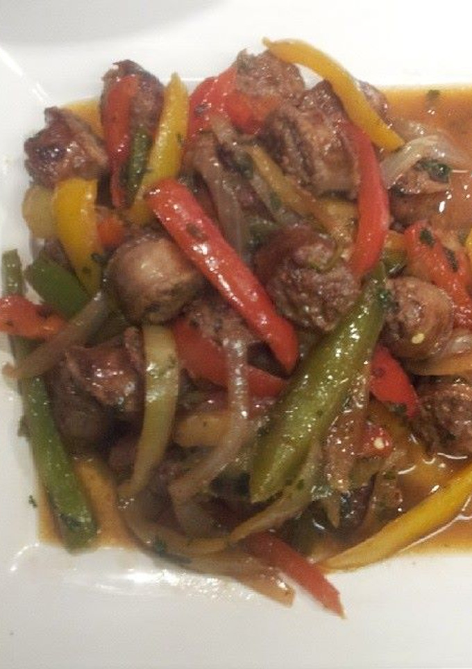 Una foto de Chorizos a la pomarola