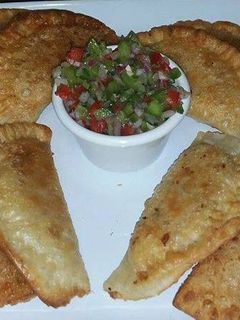 Una foto de Empanada dominicana