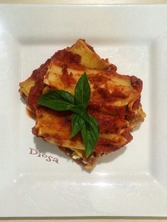 Una foto de Canelones rellenos de carne molida y queso crema