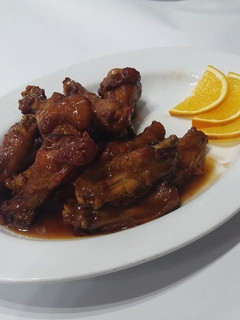 Una foto de Pollo a la naranja