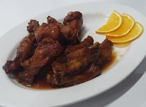 Una foto de Pollo a la naranja