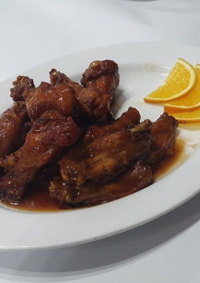 Una foto de Pollo a la naranja