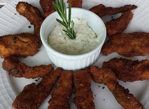 Una foto de Pollo con romero y parmesano