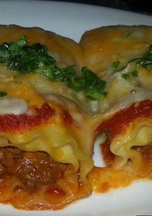 Una foto de Rollitos de lasaña