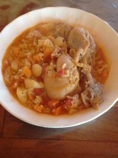 Una foto de Guiso de arroz con patas de pollo