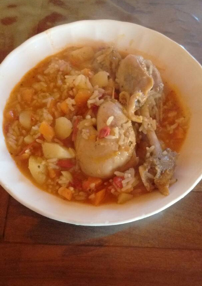 Una foto de Guiso de arroz con patas de pollo