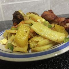 Homade Macaroni with Irish jollof & peppered chicken A picture of Homade Macaroni with Irish jollof & peppered chicken.