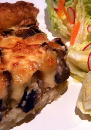 Una foto de Quiche de champiñones con base de patata trufada