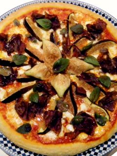 Una foto de Pizza de higos y cecina de León