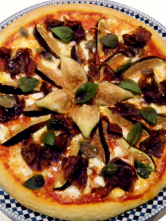 Una foto de Pizza de higos y cecina de León
