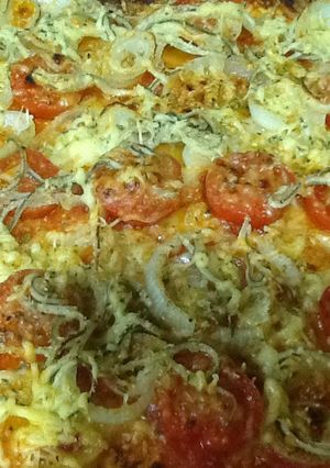 Una foto de Pizza de cebolla y gulas