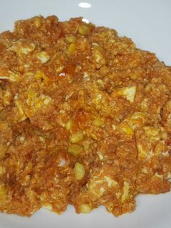 Una foto de Huevos con salsa de tomate