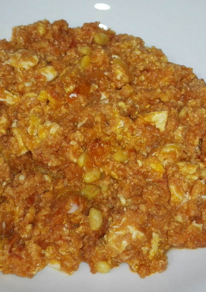 Una foto de Huevos con salsa de tomate