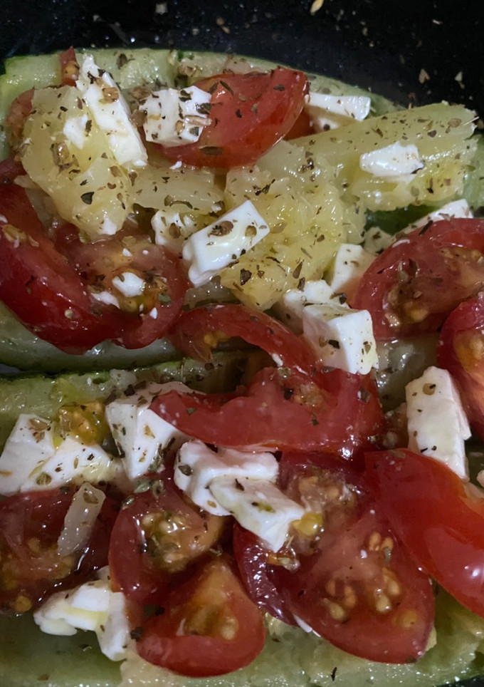 Una foto de Calabacines rellenos de tomatitos y queso fresco