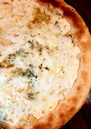 Una foto de Pizza bianca