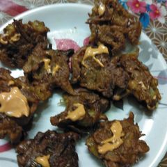 A picture of Onion Pakoda with the tangy taste of Soya sauce.