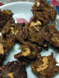 A picture of Onion Pakoda with the tangy taste of Soya sauce.