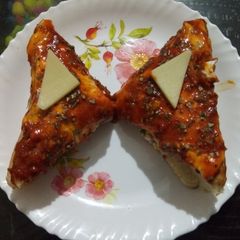 A picture of Schezwan cheese club sandwich.