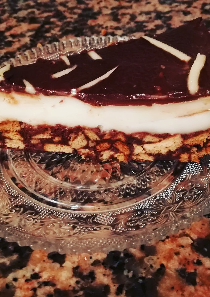 Una foto de Tarta de crema de chocolate blanco y la ganache