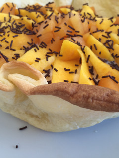 Una foto de Canasta de crema pastelera y fruta