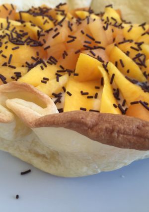 Una foto de Canasta de crema pastelera y fruta