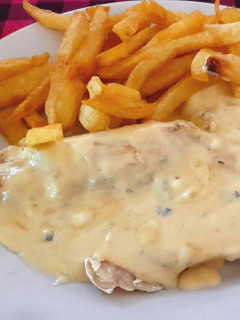 Una foto de Filet de merluza a la crema
