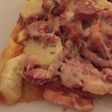 Pizza de hojaldre con calabacín y salchichas